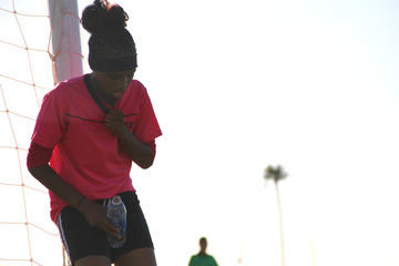 Team Mercury’s Sahana Abillo catches her breath during a mandatory water break. Phoenix, Arizona. Sept. 19, 2015. (VOA/Victoria Macchi)