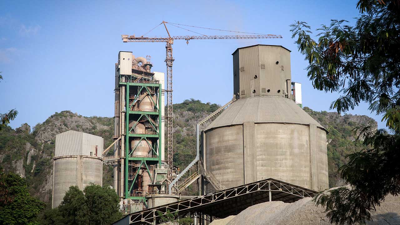 Kampot Cement Factory is seen at the foothill of Totung Mountain