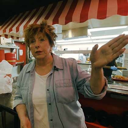 Photograph of Kathi Vidrine inside Steamboat Bill’s restaurant 