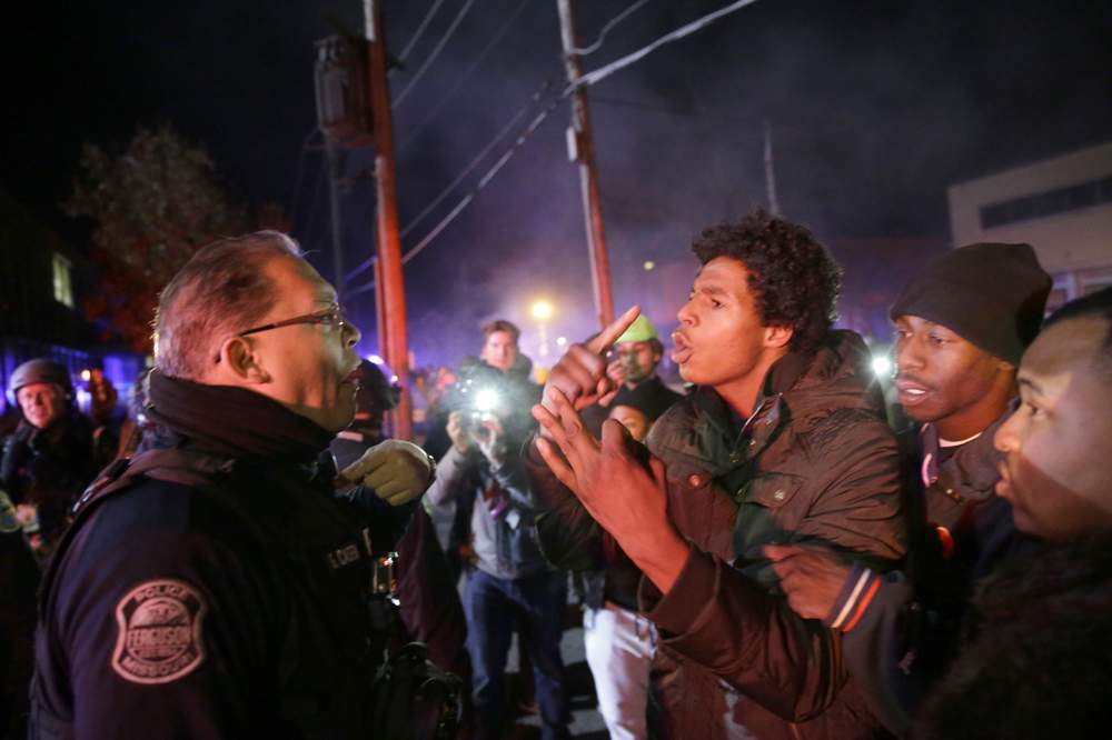 Tempers flair between police and protestors: photo AP