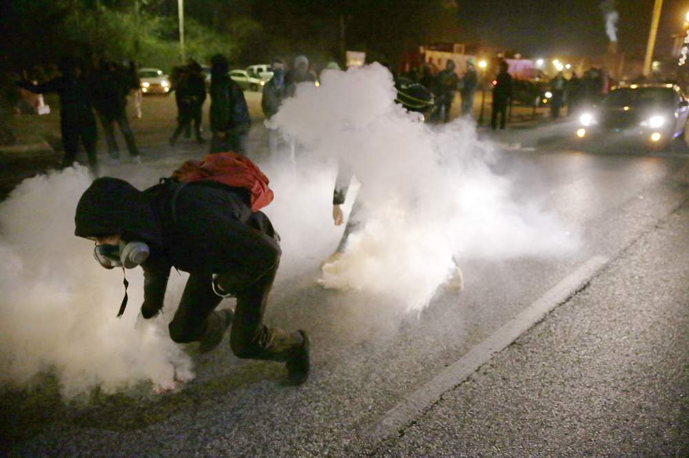 Police deploy tear gas: Photo AP