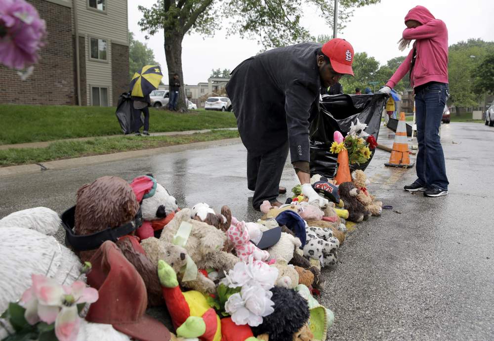 Flowers are placed  on the street Michael Brown was killed: Photo AP