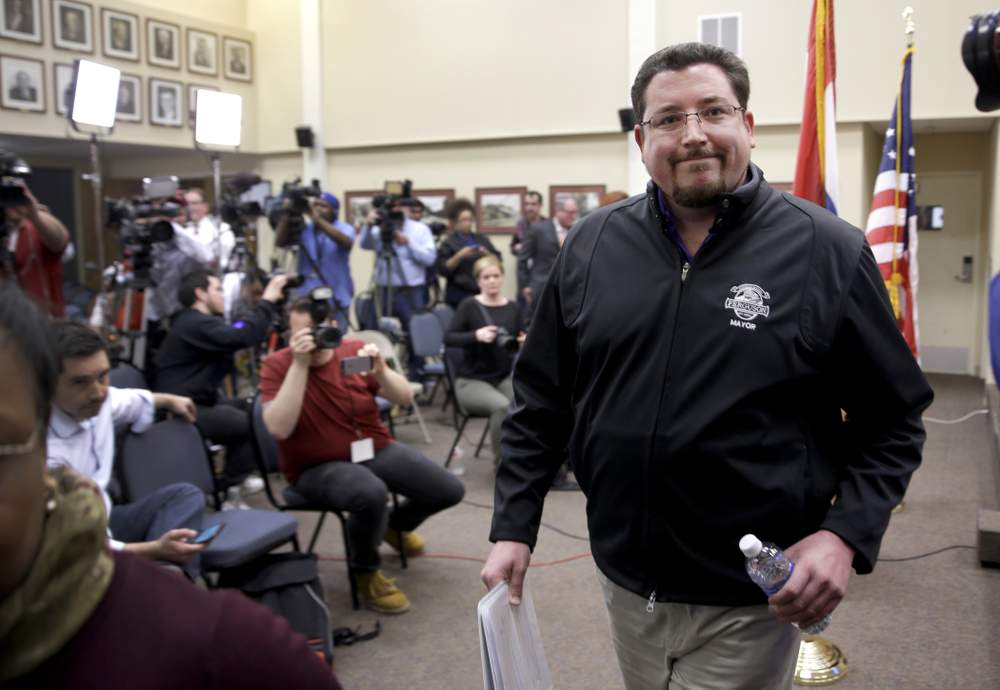 Mayor Knowles leaves news conference announcing police chief&#39;s resignation in March, 2015: Photo AP