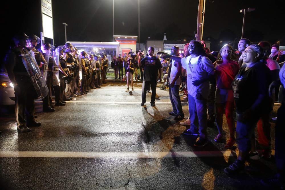 Police and protestors meet Ferguson August 2015: Photo AP