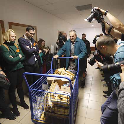 Evidence is wheeled into the courtroom for a pretrial hearing in Pezinok, Slovakia, on December 19, 2019. The investigation into Kuciak’s killing brought his murderers to justice and uncovered mass corruption in Slovakia.  