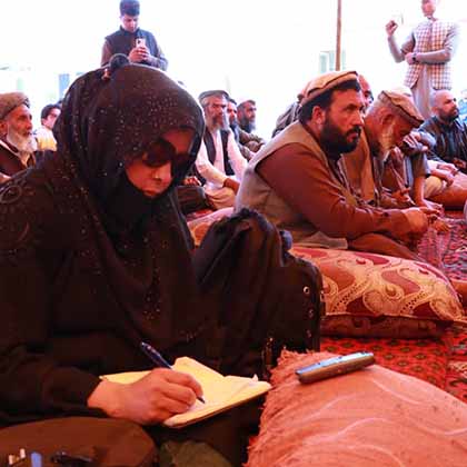 Meena Habib attends a Taliban meeting with local residents outside Kabul. 