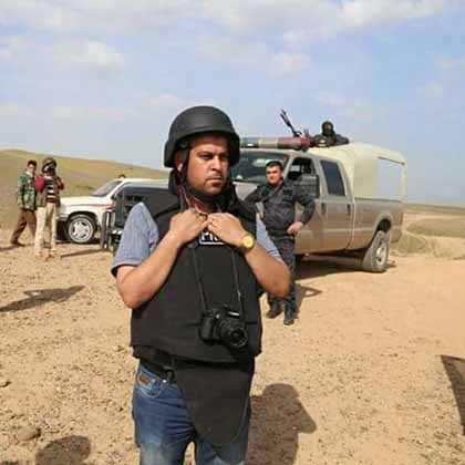 Photojournalist Hazhar Rasheed Kakayee on assignment in the disputed province of Kirkuk.  