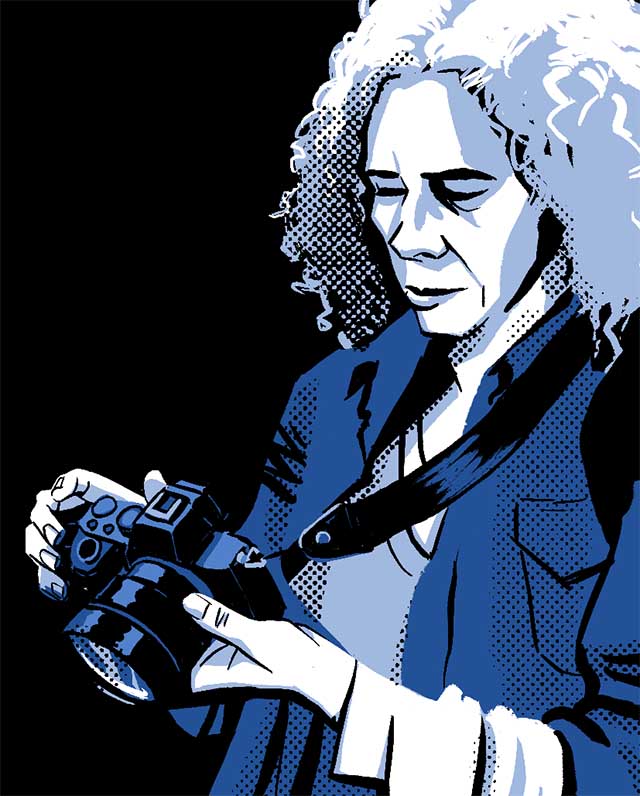 Comic book illustration of García adjusting her camera. 