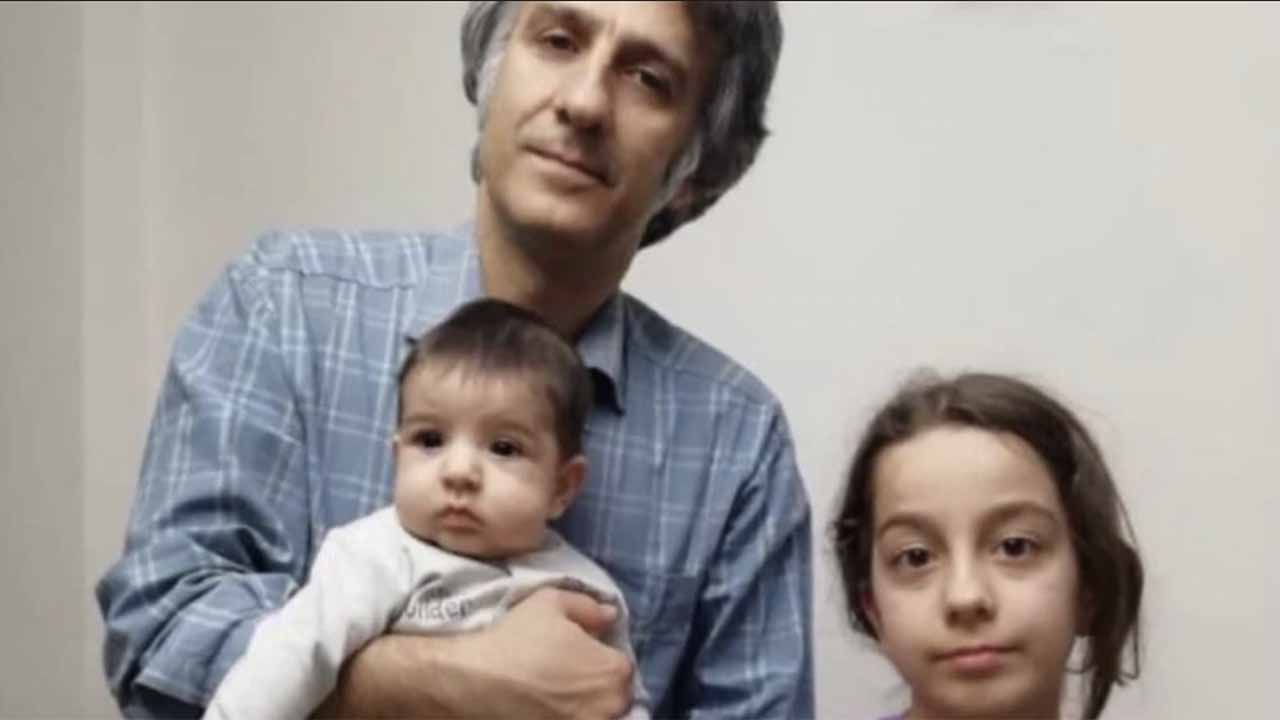 Alireza Alinejad, brother of New York-based VOA Persian TV host Masih Alinejad, with his infant son and daughter prior to his September 2019 arrest by Iranian authorities. (Courtesy Masih Alinejad)