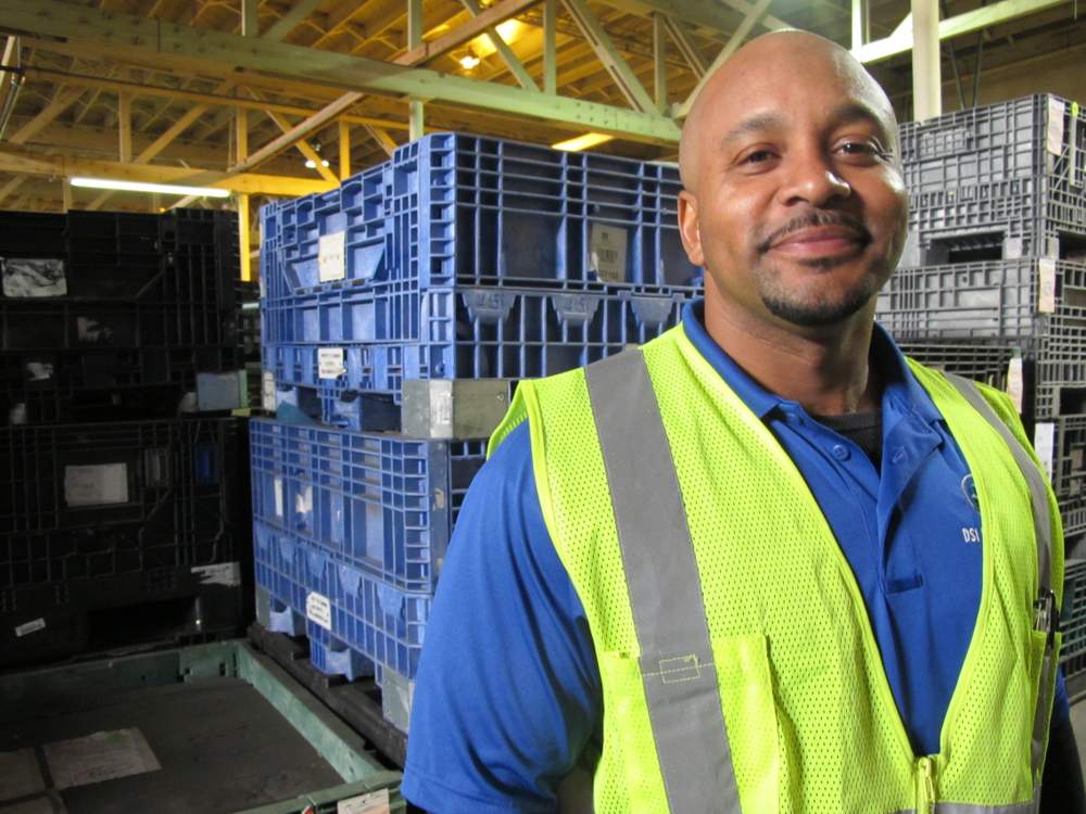 Ex-offender Wade Tatetakes pride in his work as a forklift operator for DSI Warehouse Inc. ingreater Memphis, Tenn. (C. Guensburg\/VOA)
