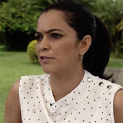 Screenshot portrait of Ashmita Sapkota sitting outside.